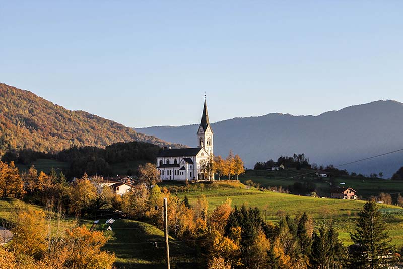 Church that is near the village of Dreznica in the alps of Slovenia. This area is perfect for hikers. There are short hikes here as well as much longer hikes that take you through alpine meadows and up mountain-sides.