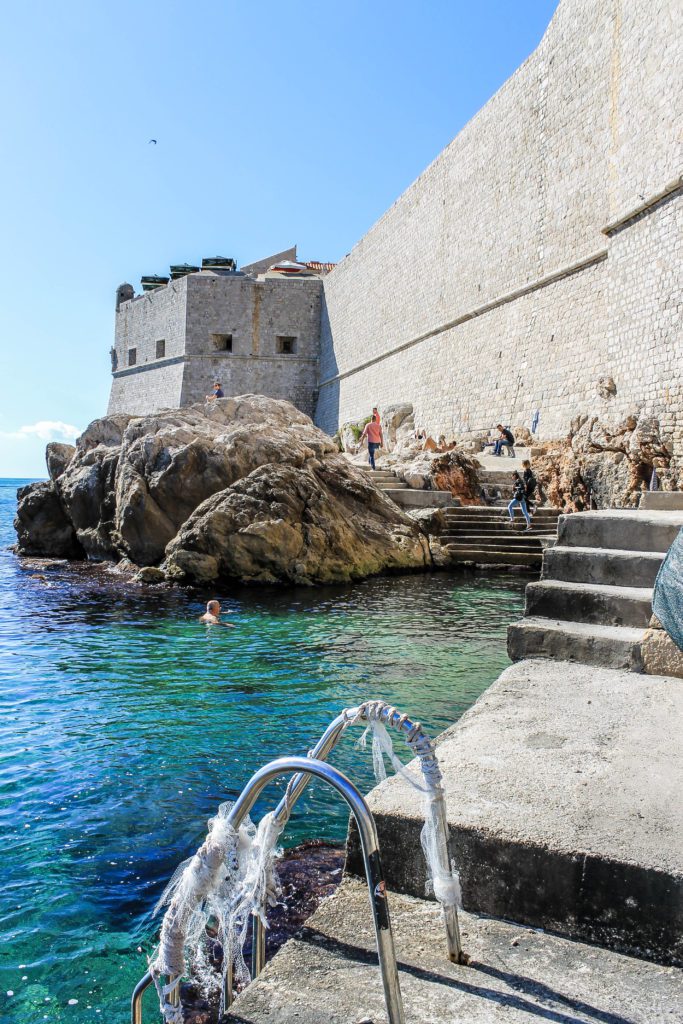 Swimming near the walls of Dubrovnik is one of the best things to do in Dubrovnik. Dubrovnik is a beautiful coastal walled city to add to your Europe vacation.