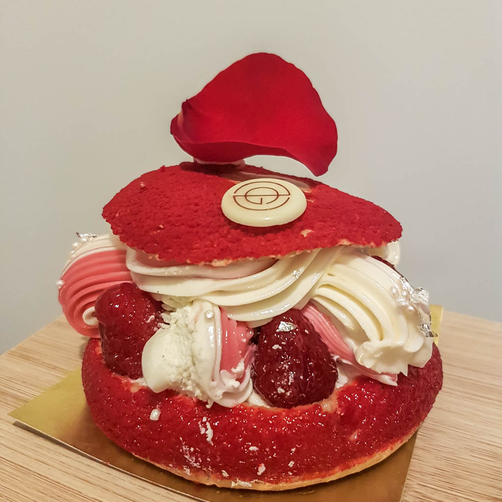 The gorgeous Paris Brest French dessert, Ispahan flavour. Rose, lychee and raspberry flavoured choux pastry from Nugateau in Toronto