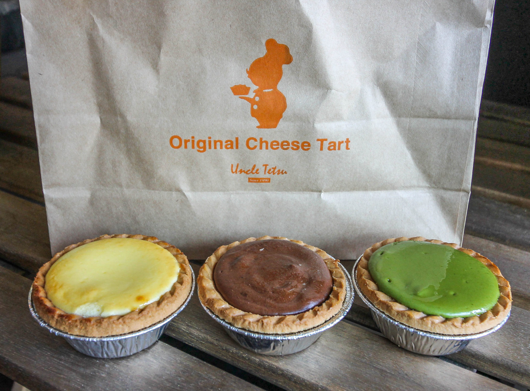 Three cheese tarts from Uncle Tetsu's bakery in Toronto in plain, chocolate, matcha