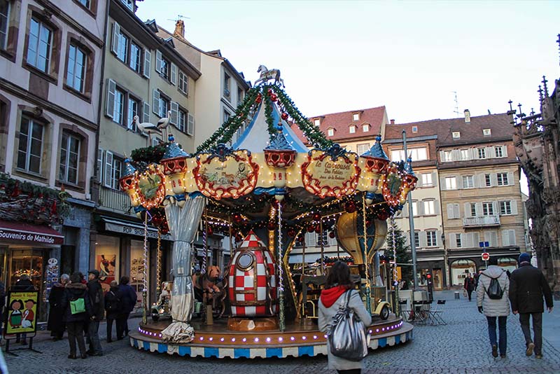 A Christmas themed carousel at the Christmas market in Strasbourg France