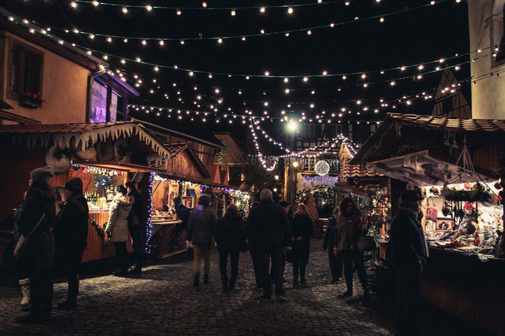 Christmas lights strung up over the Christmas market at Eguisheim France at night