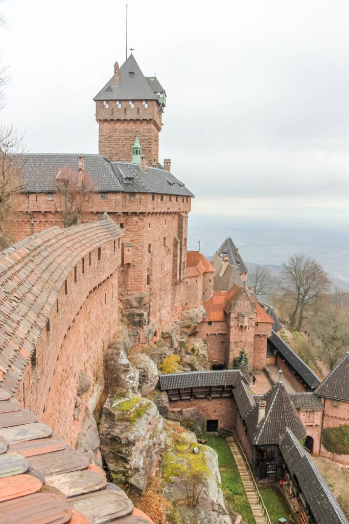 The sandstone coloured exterior of Haut-Koenigsbourg castle in Alsace France visited as part of the Alsace wine route and one week in France during winter