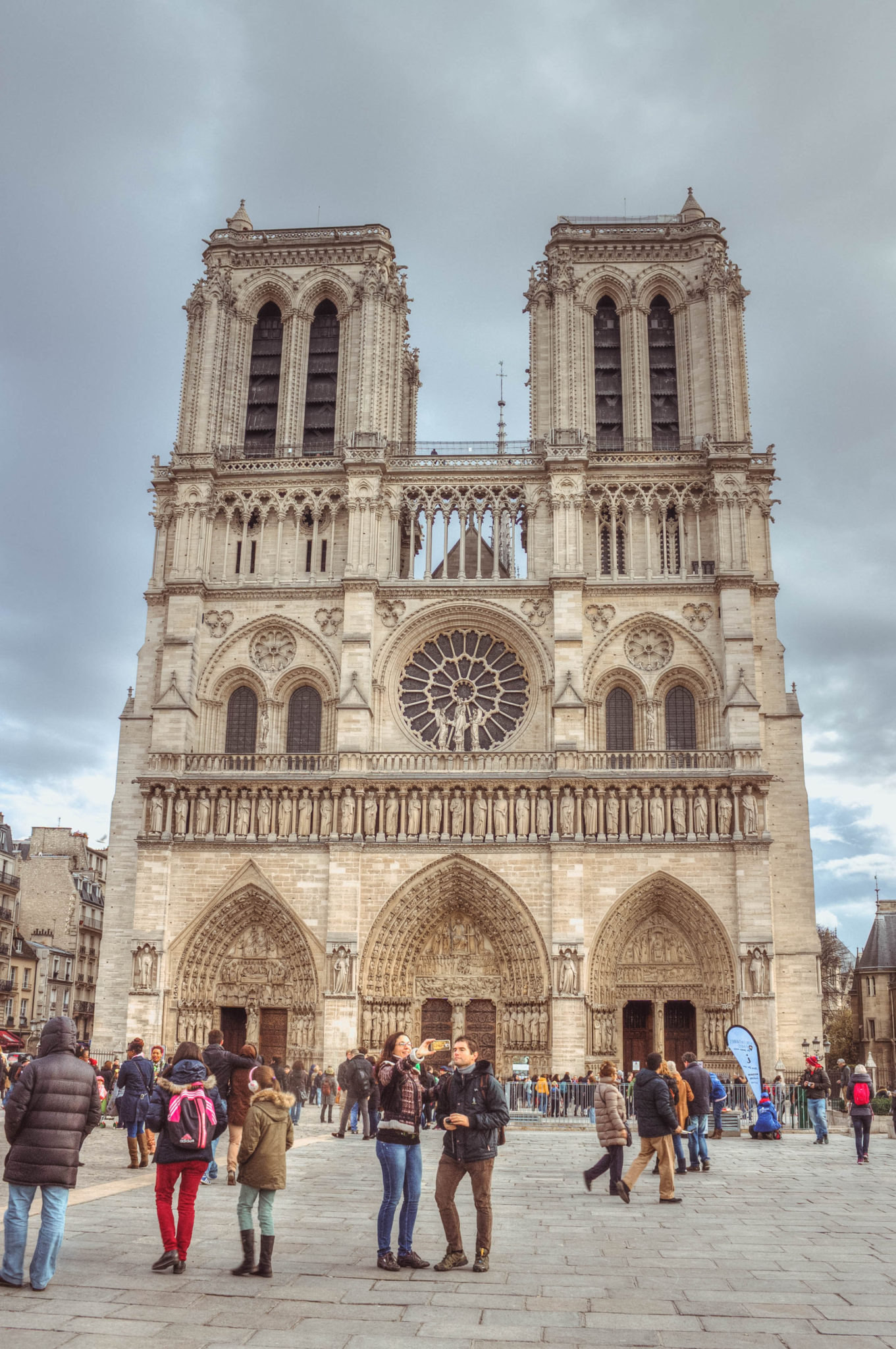 Front view of gothic Notre Dame Cathedral in Paris France with the rose window