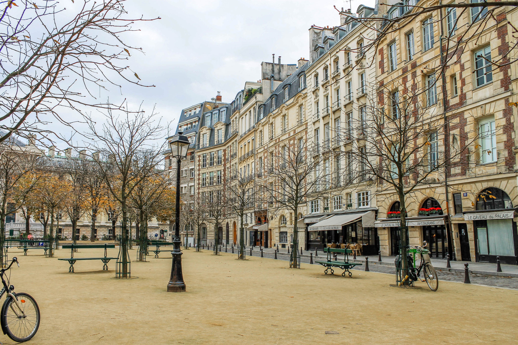 A square in Paris with buildings around it