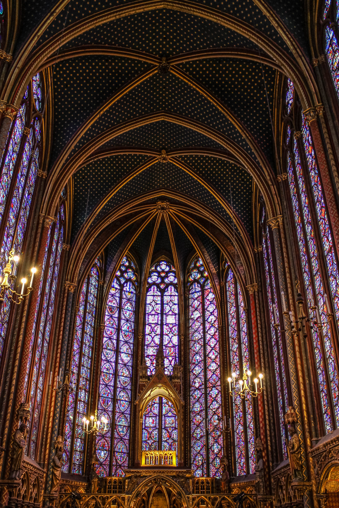 Interior of Sainte Chapelle in Paris France. Stained glass windows surround the entire buidling