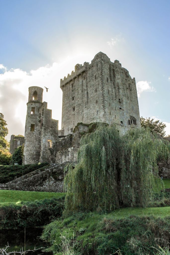 Blarney Castle with the sun behind it