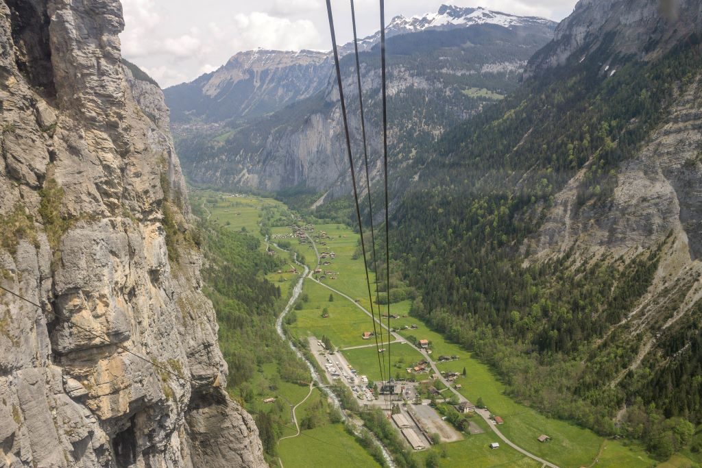 Cable car above Stechelberg village, Switzerland. Looking down into Lauterbrunnen valley