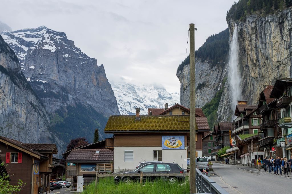 Lauterbrunnen village with waterfalls and alps in background