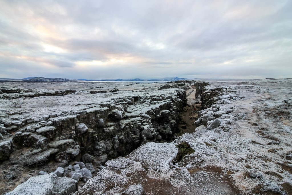 At Thingvellir National Park, Iceland, you can walk between two tectonic plates. You can also dive or snorkel here as well.