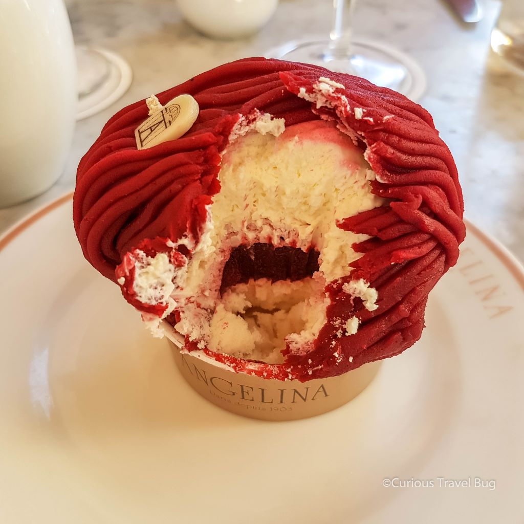 Cherry Mont Blanc from Angelina's Tea House in Paris, France. This is a variation on Angelina's signature Mont Blanc dessert with a meringue, cherry filling, chantilly cream, and a cherry vermicelli topping.