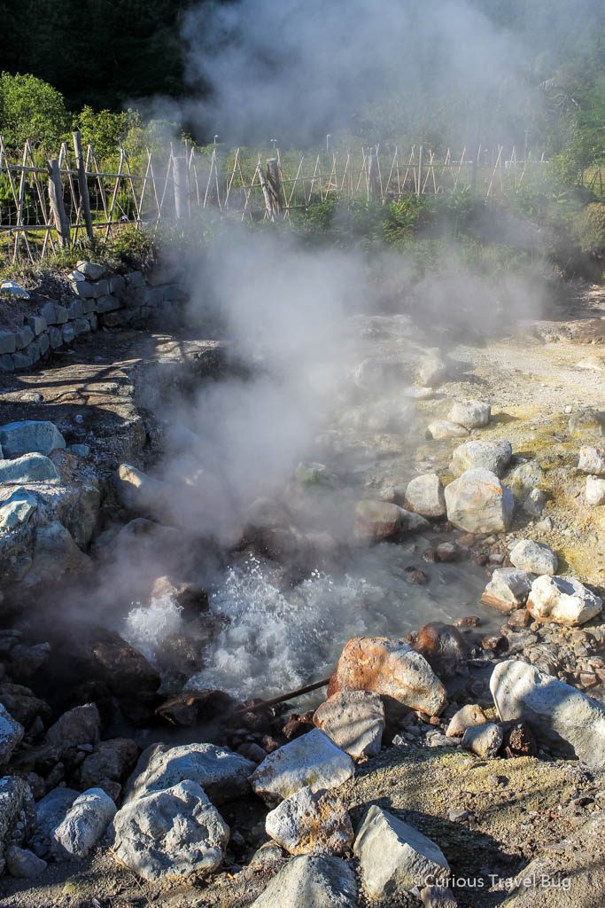 Bubbling water of a fumarole in the hot spring area of Furnas near the lake on Sao Miguel, Azores