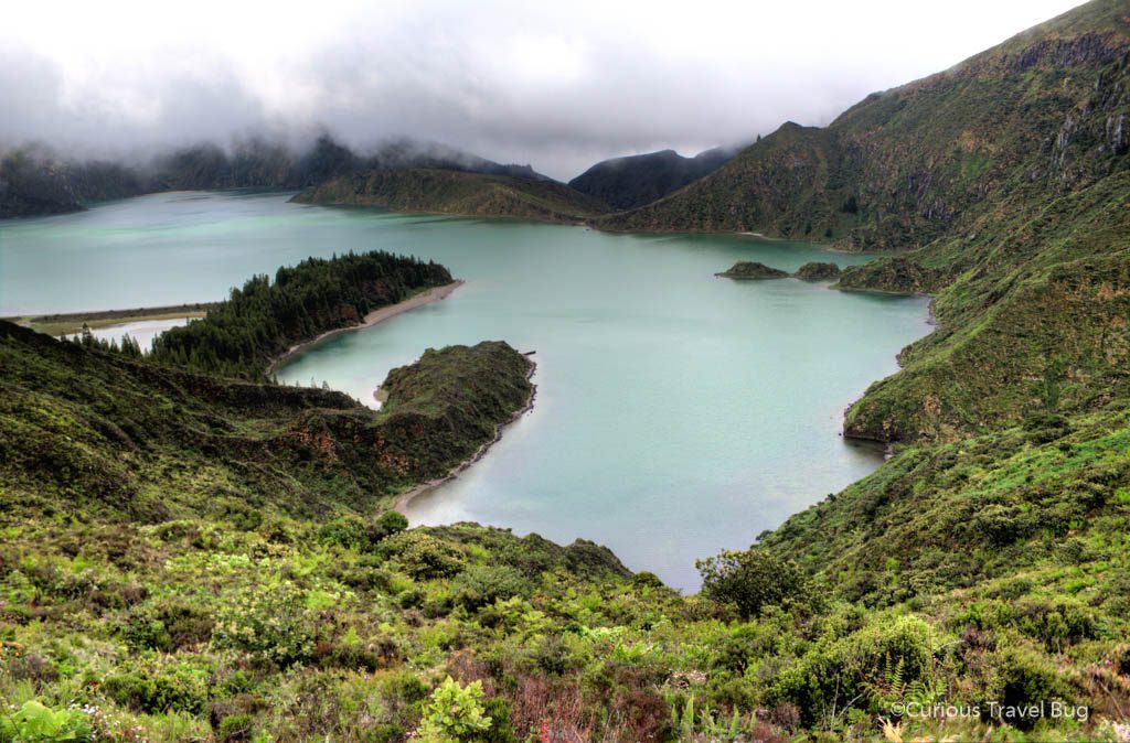 Lagoa do Fogo is one of the prettiest lakes in the Azores. It's located on Sao Miguel and is an easy day trip from Ponta Delgada. This volcanic crater lake is a gorgeous sight in the Azores and belongs on any Azores itinerary.