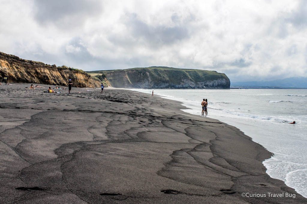 The black sand beach of Santa Barbara near Ribeira Grande on Sao Miguel. This is one of Portugal's most beautiful black sand beaches and deserves to be part of your travel plans.