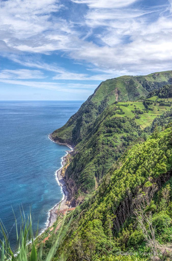 Gorgeous view of the lush green coastline of the eastern side of Sao Miguel island in the Azores. This is from the miradouro Ponta do Soussego viewpoint that offers sweeping views of the Portuguese coast. This is a must when travelling to the Azores.