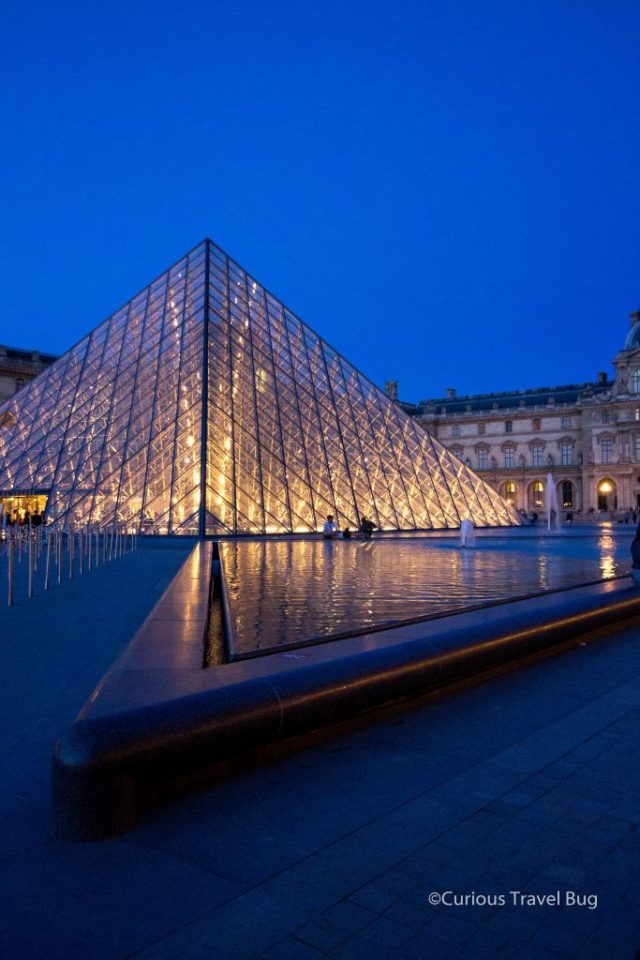 The Louvre Pyramid at night. Even if you don't visit the Louvre, you should still check out the glass pyramid to see it lit up at night.
