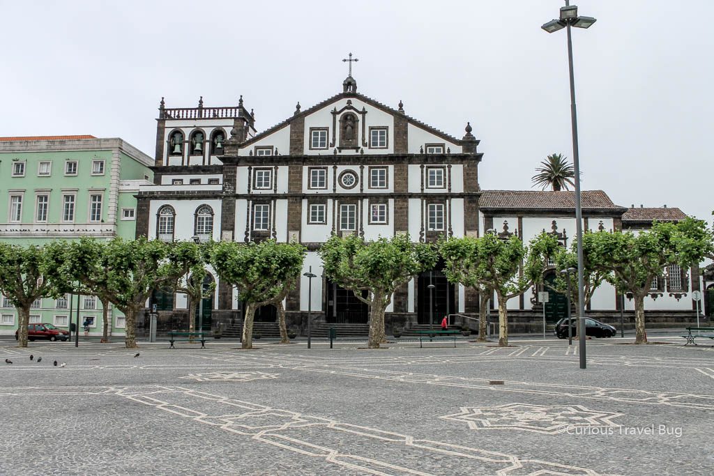 Walking around Ponta Delgada in the Azores, Portugal gives you views of white and black buildings like this one as well as interesting tile patterns on the sidewalks and squares. 