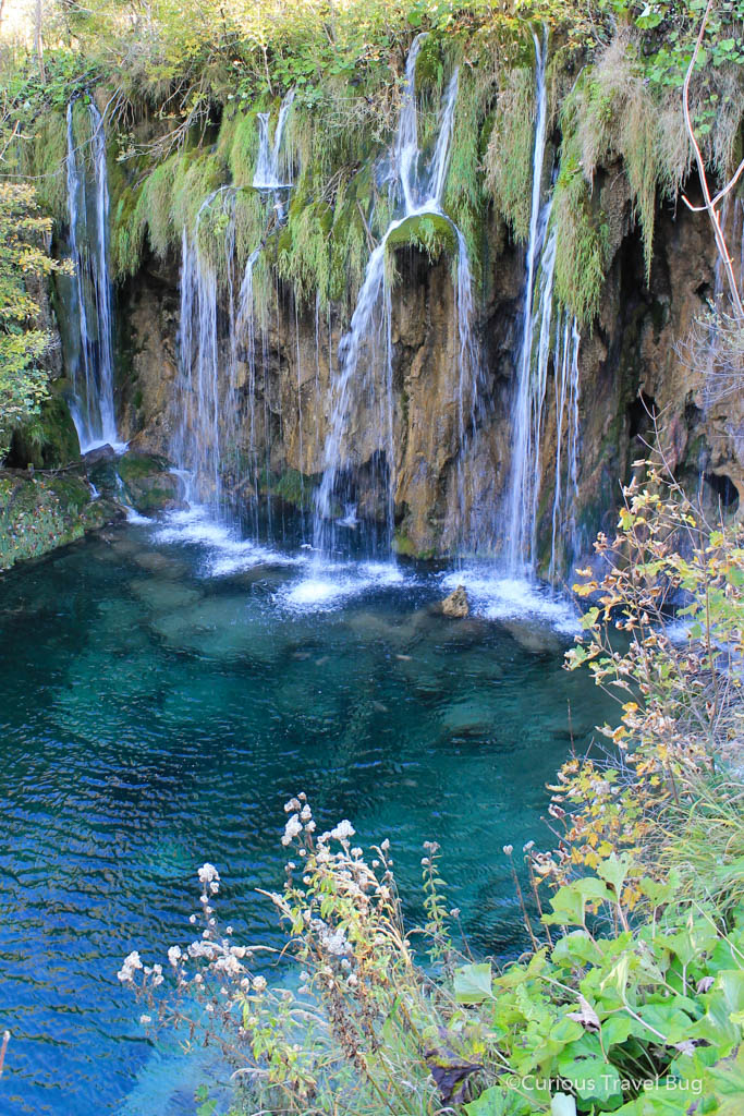 Waterfalls and teal lakes in Croatia's Plitvice Lakes.