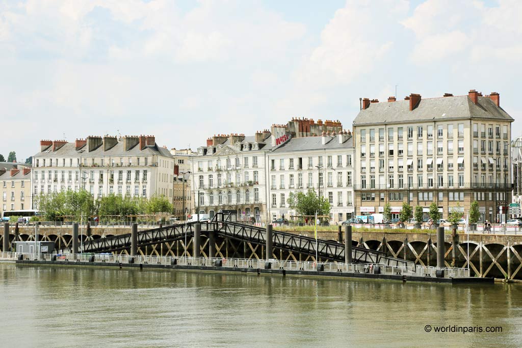 The river Loire and buildings in Nantes, western France. This city is home to Jules Verne museum as well as fantastic architecture and is just a short trip from Paris.