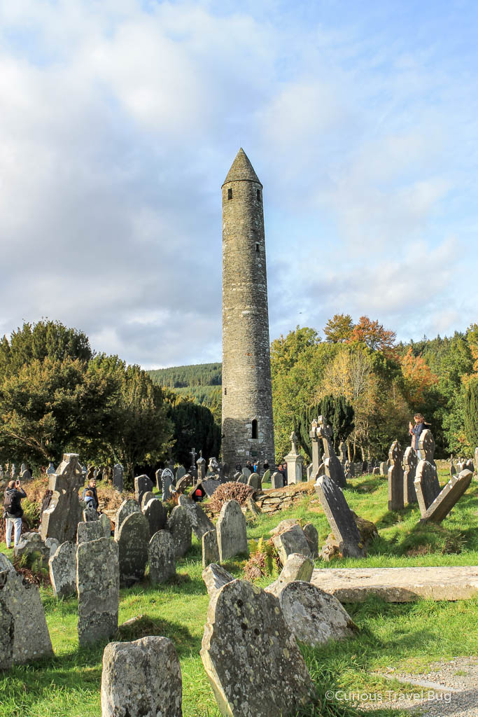 The round tower and gravestones at Glendalough, Ireland. Glendalough is only one hour from Dublin so it makes a fantastic day trip.