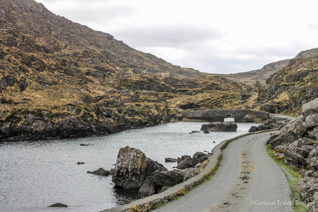 The road in the Gap of Dunloe. You can drive, hike, bike, or taking a jaunting cart to explore this beautiful location in County Kerry, Ireland.