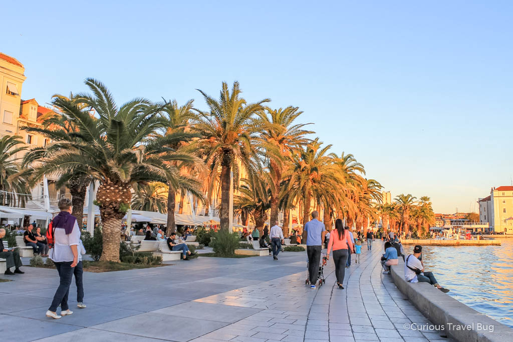 Strolling along the Riva Promenade in Split, Croatia at sunset is the perfect way to end a day in Split. It's one of the top things to do in the city.