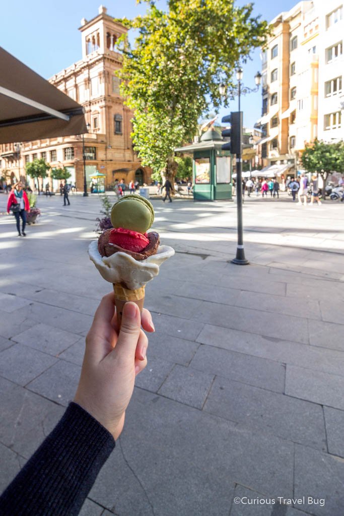 Gelato in Seville, Spain, shaped to look like a rose and topped with a pistachio macaron.