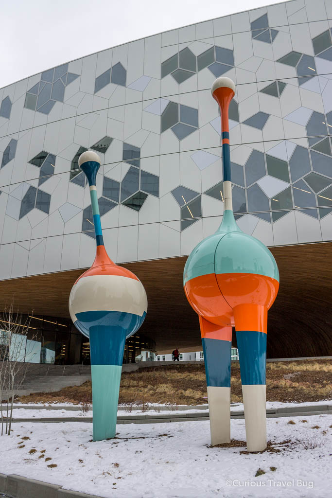 The Drinking Bird art installation outside of Calgary's Central Library. These quirky art pieces are a new addition to the city and are one of the best instagram spots in Calgary