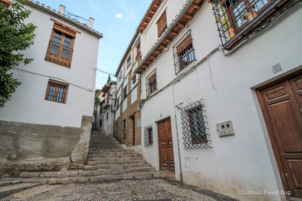 The narrow, maze-like streets of Albayzin, Granada. This is one of the best things to do in Granada