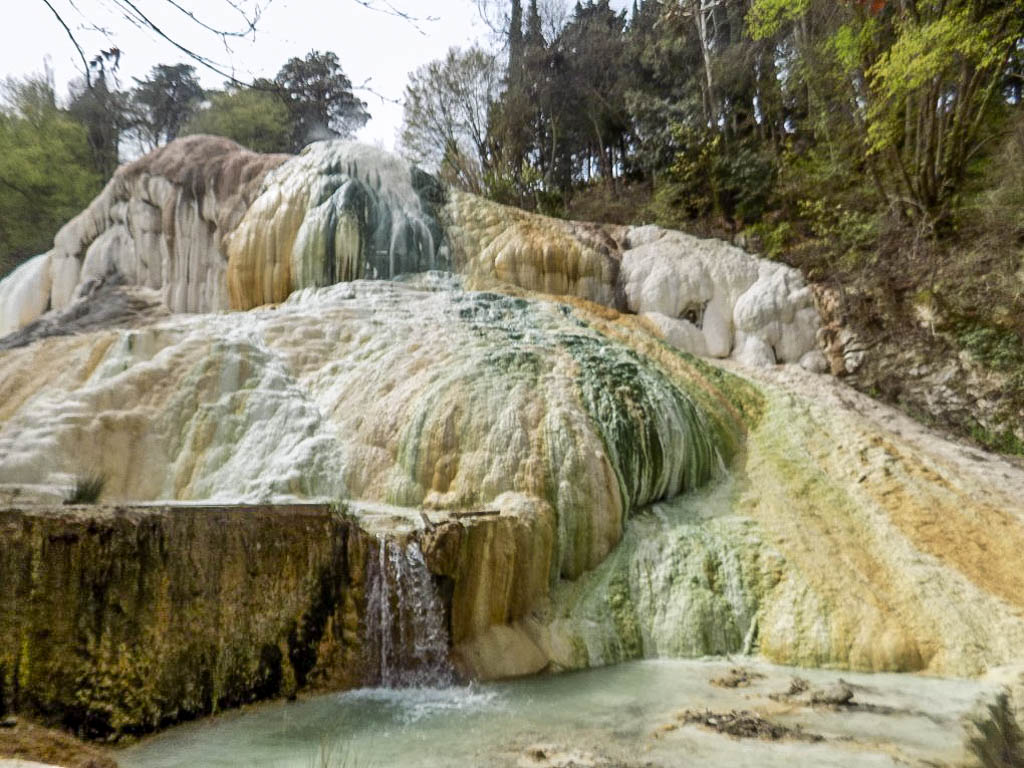 Bagni San Filippo thermal waterfall in Tuscany, Italy. This waterfall was created from the thermal hot springs in the area and is one of the best waterfalls in Italy.