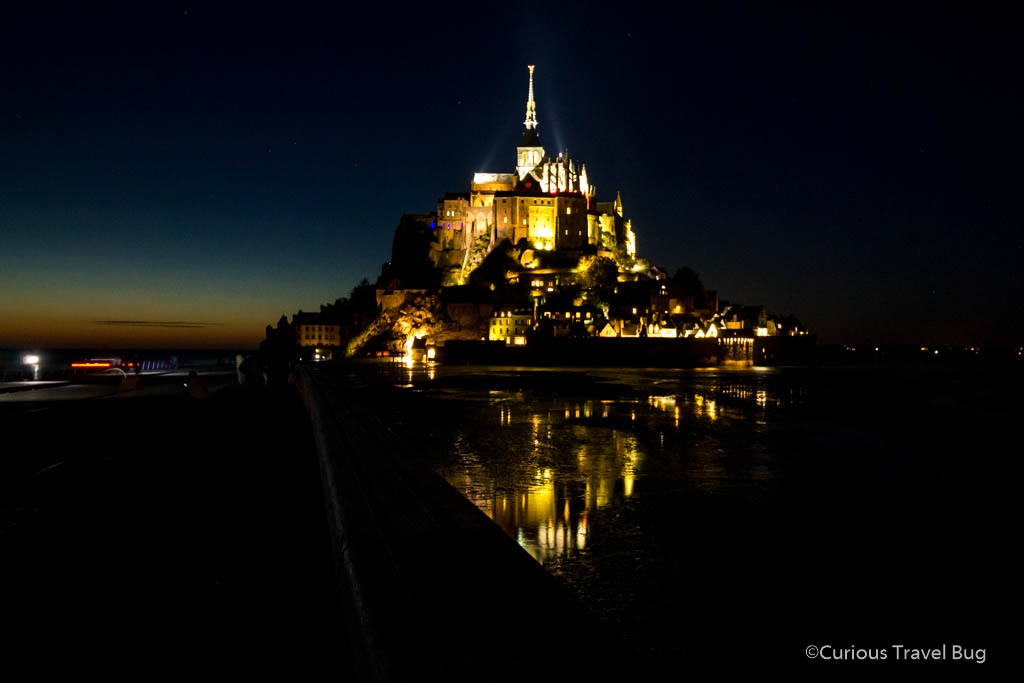 Mont Saint Michel lit up at night.