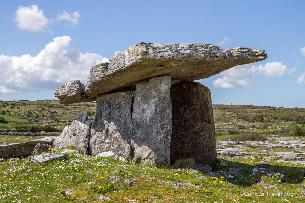The Poulnabrone Dolmen is a Neolithic tomb that is older than the Pyramids of Giza. This is one of the top sights to see when you visit Burren National Park in Ireland. It is easy to see as a day trip from the city of Galway on a tour to see the Cliffs of Moher.