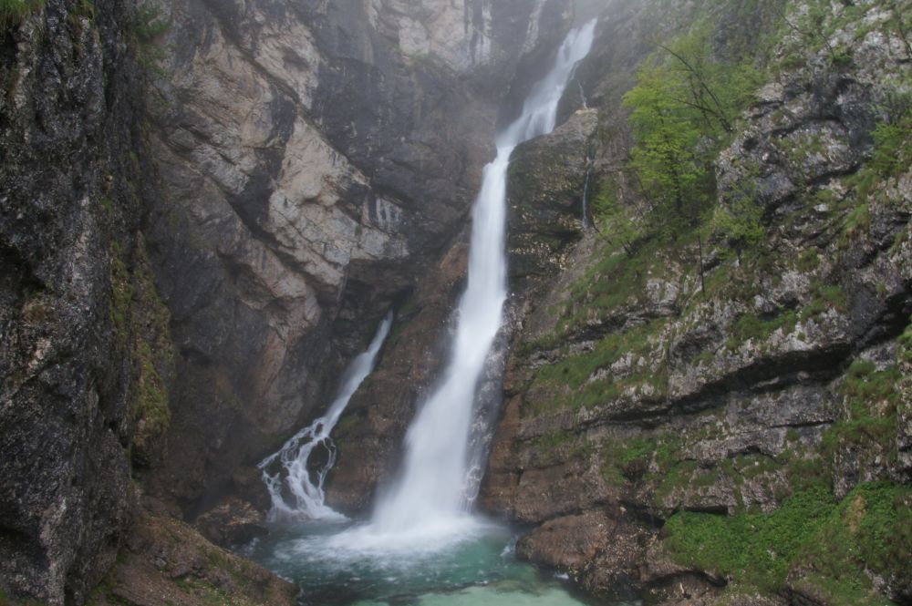 Savica waterfall in Slovenia's Triglav National Park is one of the country's most famous waterfalls and a great option to visit in Europe. After a short hike near lake Bohinj, this waterfall is the reward at the end of the path.