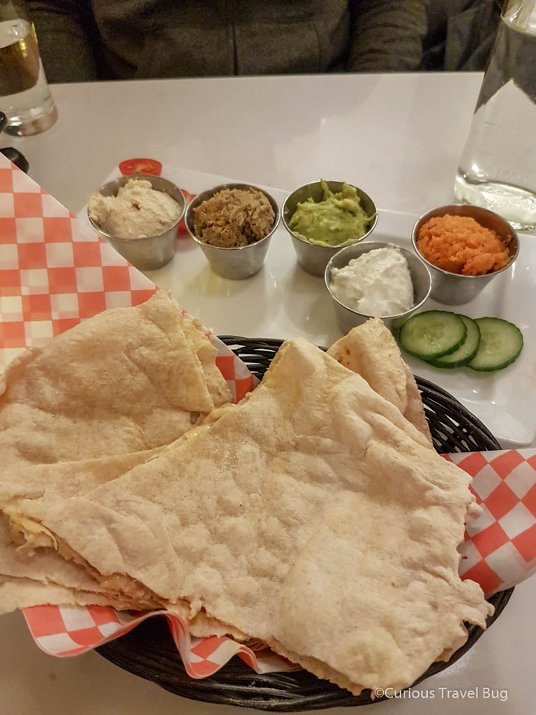 Mezze and chapati plate with vegan dips at Aux Vivres, Montreals original vegan restaurant.