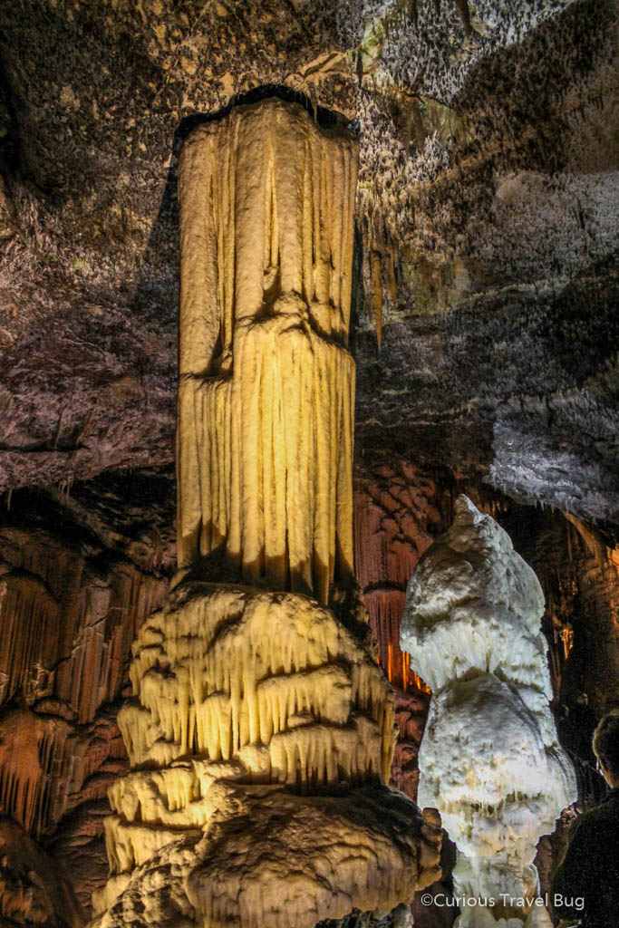 Brilliant, a famous white stalagmite in Postojna Cave, Slovenia. This show cave combined with Predjama Castle make for the perfect day trip in Slovenia.