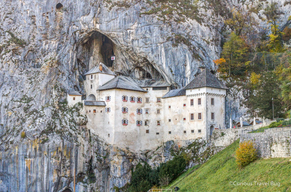 Predjama castle is a unique castle in a cave that you can find on a day trip from Ljubljana.