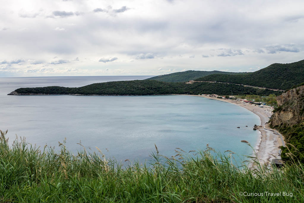 Scenery of Montenegro when driving from Kotor to Budva. This is a view of Jaz beach with the small peninsula behind it.