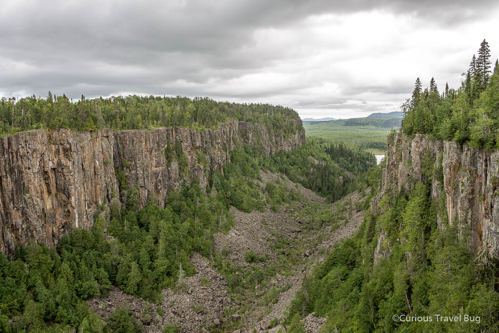 Ouimet Canyon in northern Ontario with a cloudy sky. This 100m deep canyon is an interesting stop on any road trip.