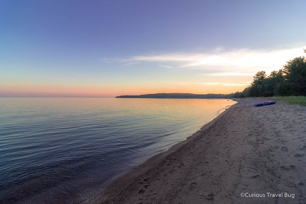 Sunset over Pancake Bay Provincial Park on the coast of Lake Superior in Canada. This is a beautiful first stop on your northern Ontario road trip.
