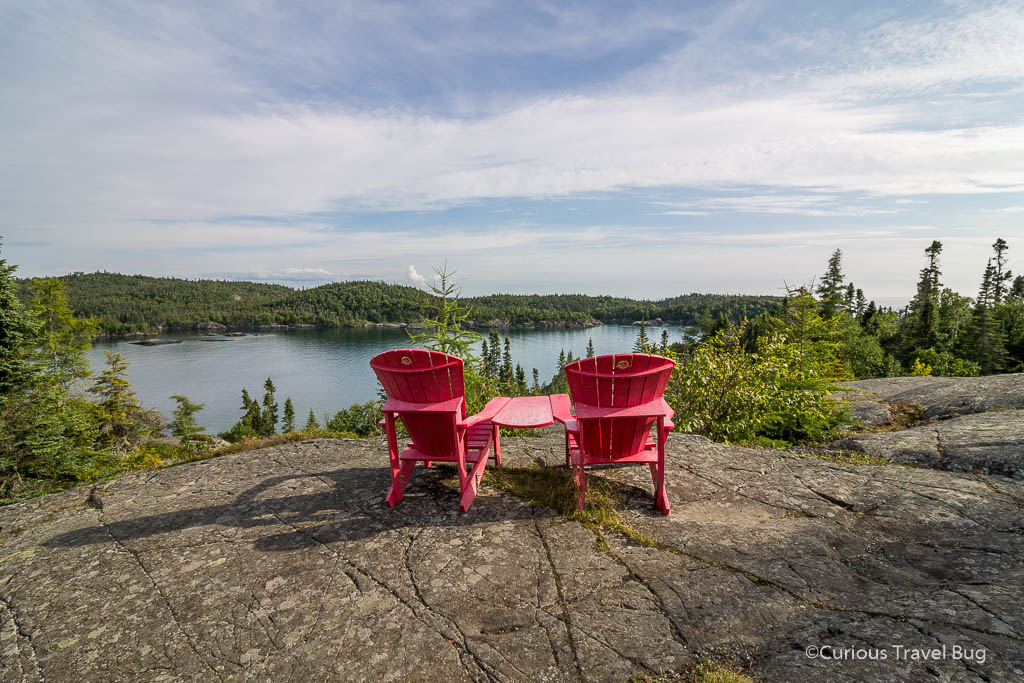 Two red chairs overlooking Lake Superior at Pukaskwa National Park on the Southern Headlands trail