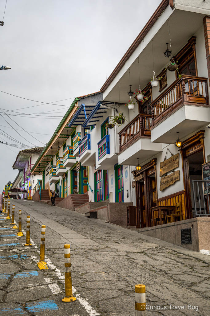 Steep streets and colourful doors and details on houses in Salento, Colombia