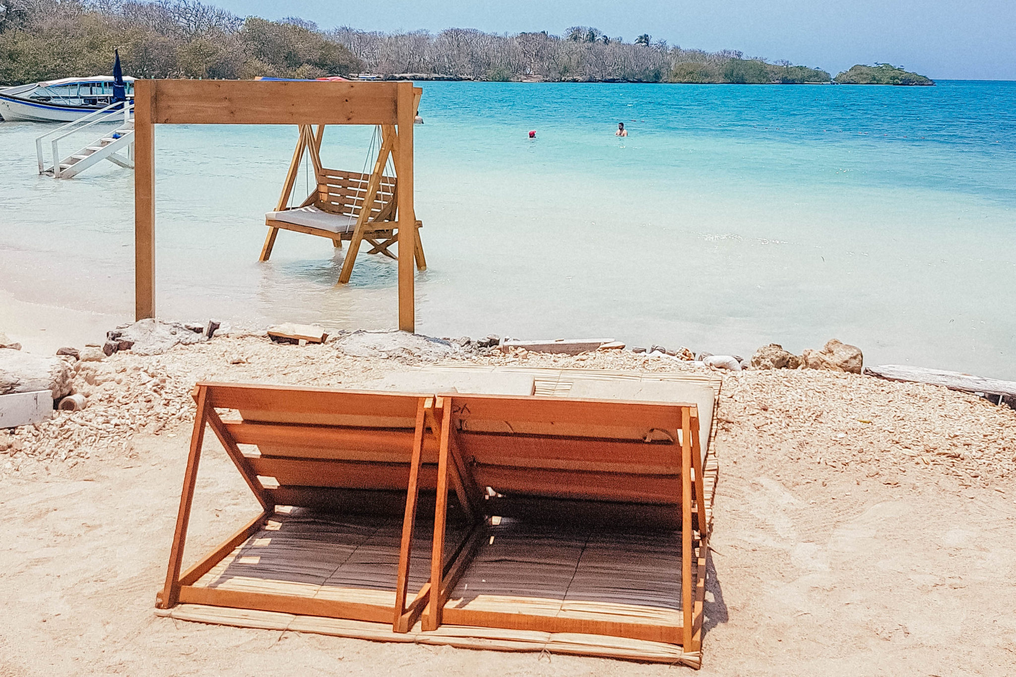 Lounger on the beach of Islabela in the Rosario Islands, a perfect day trip from Cartagena, Colombia