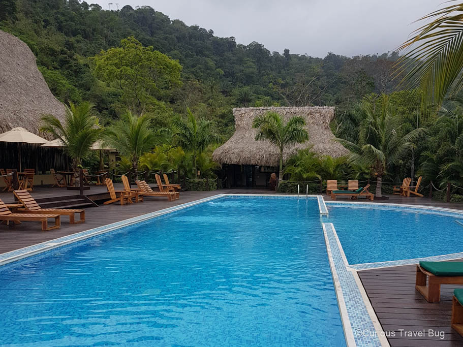 Senda Koguiwa hotel near Tayrona National Park pool and traditional style buildings set amid the jungles of Colombia
