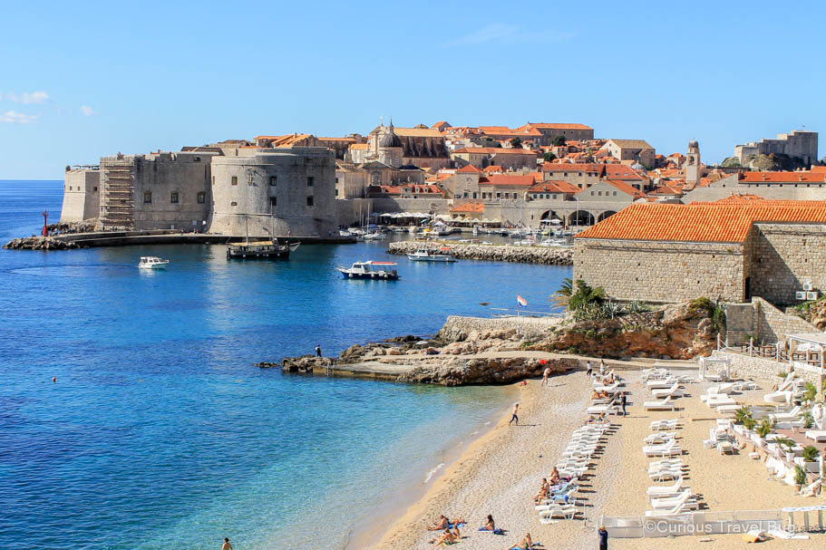 The port of Dubrovnik with the walls and Banje Beach in the foreground. This is the perfect view of Dubrovnik.