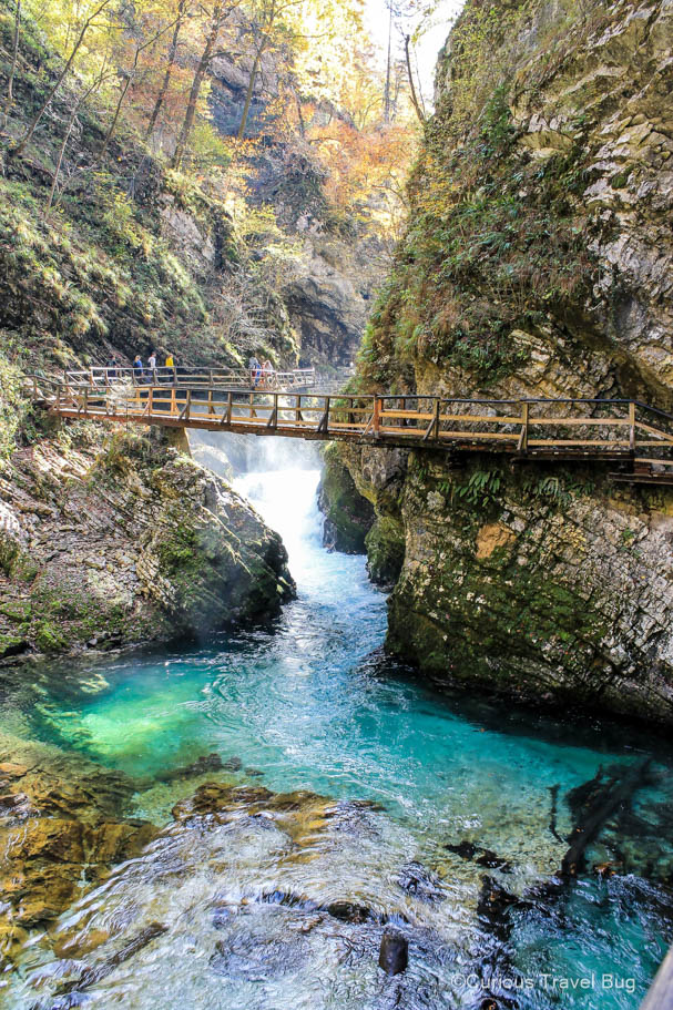 Bridge above teal water in Vintgar Gorge near Lake Bled, Slovenia