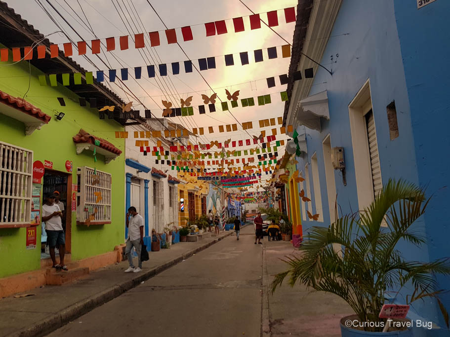 Colorful buildings and flags in the shape of butterflies in the Getsemani area of the Caribbean city of Cartagena