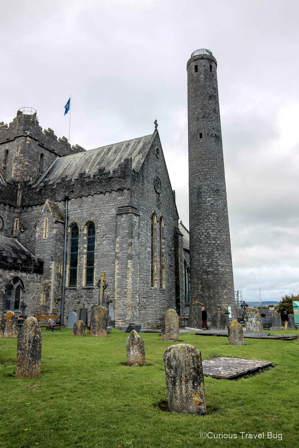 The medieval round tower and cathedral of St. Canice in Kilkenny, Ireland. This is at one end of Ireland's Medieval Mile and is worth a visit to explore this old site.