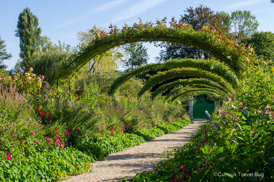Arches over the Clos Normand garden at Giverny House in Normandy, France