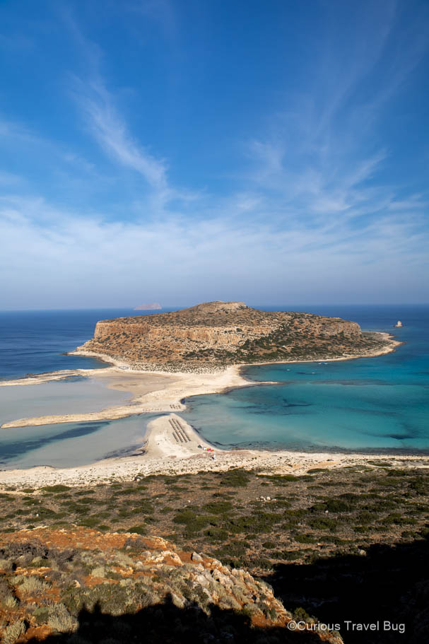 Balos Bay from above with clear water white sand. Balos Bay is a must visit destination in Crete and should be on every one week itinerary to Crete for first time visitors.