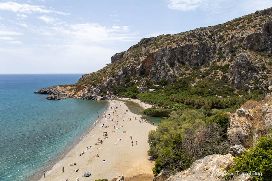 View of Crete's famous palm beach, Preveli with white sand and palm trees.